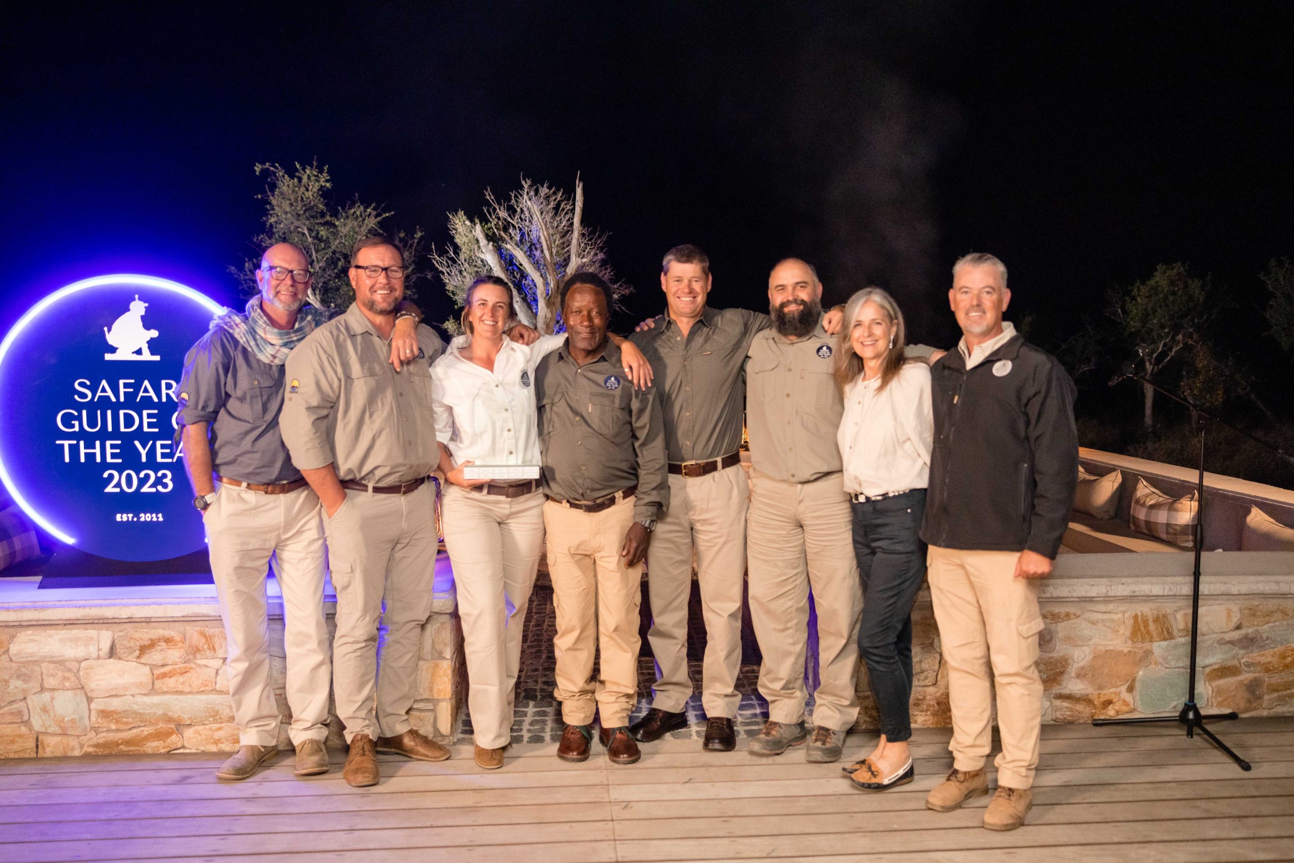 Kimberlee Le Hanie stands with the Safari Guide of the Year Judges