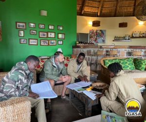Akagera students studying FGASA learning materials
